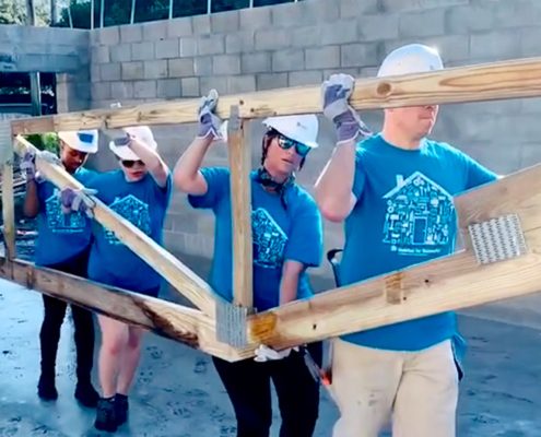 Habitat Hillsborough Global Village team builds “Lego-like” house from recycled plastic bricks